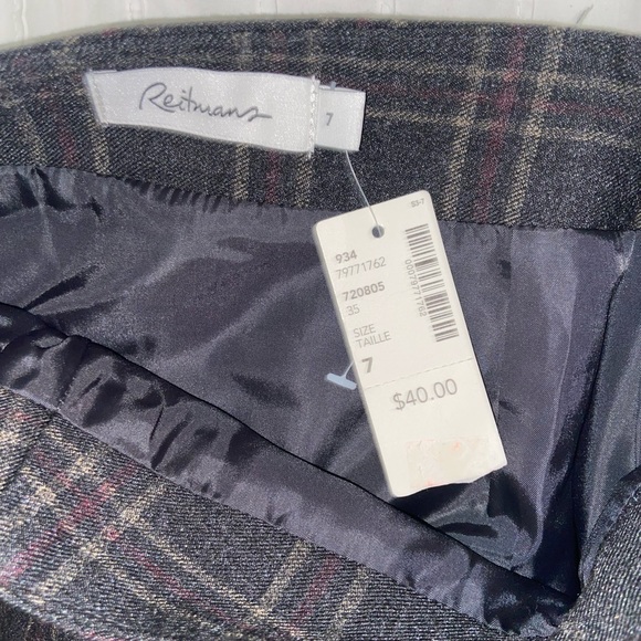 Plaid skirt with leather strip of fabric - Picture 3 of 4